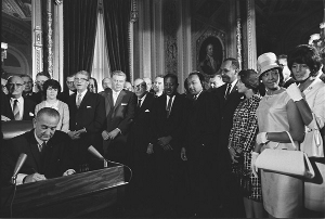 Aug. 6, 1965<a name="VRA"></a> - President Johnson Signs the Voting Rights Act